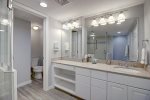 Master vanity with privacy door to the lavatory